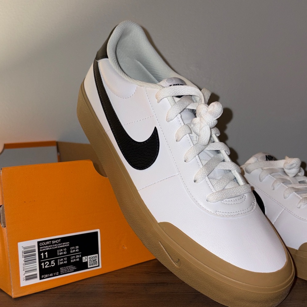 Nike Men's White Sneakers with Black Swoosh and Gum Sole